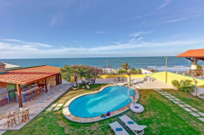 Casa incrível na beira mar da Praia de Iguape por Carpediem